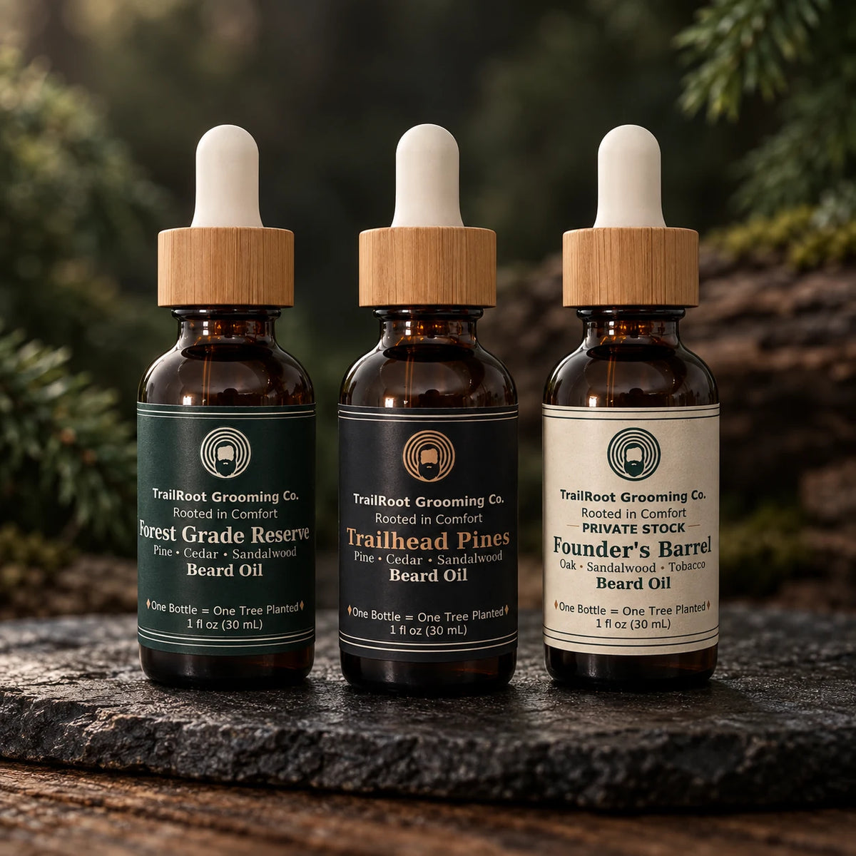 The three signature TrailRoot beard oils: Forest Grade Reserve, Trailhead Pines and Founder's Barrel.
